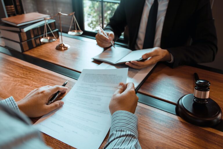 Lawyer is providing information about the client's trial at the lawyer office.